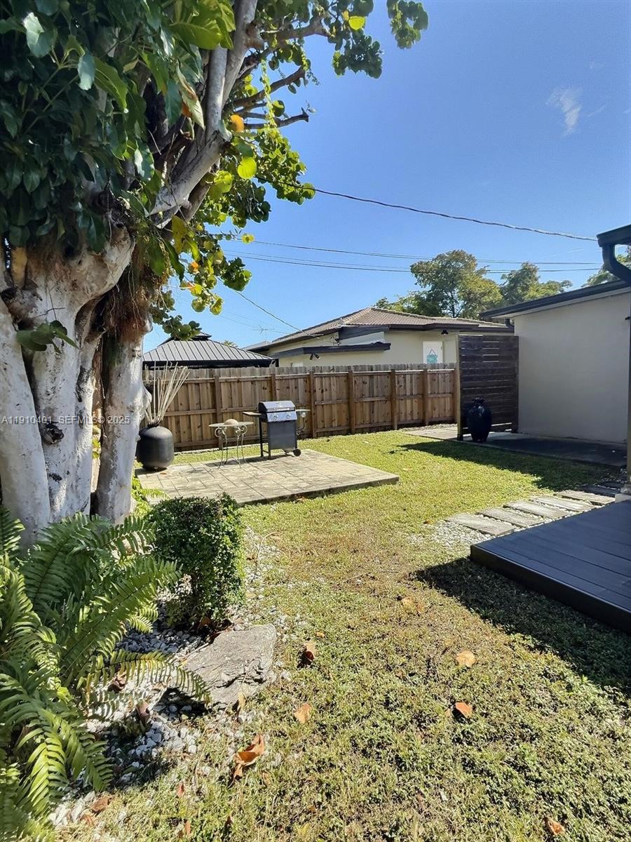 6541 Southwest 18th Street Miami, FL 33155 - Photo 19 of 22 a view of a house with swimming pool
