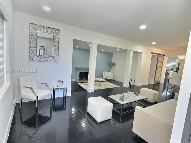 a living room with furniture and a table