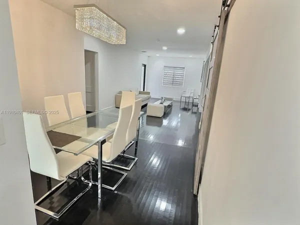 a view of a dining room with furniture