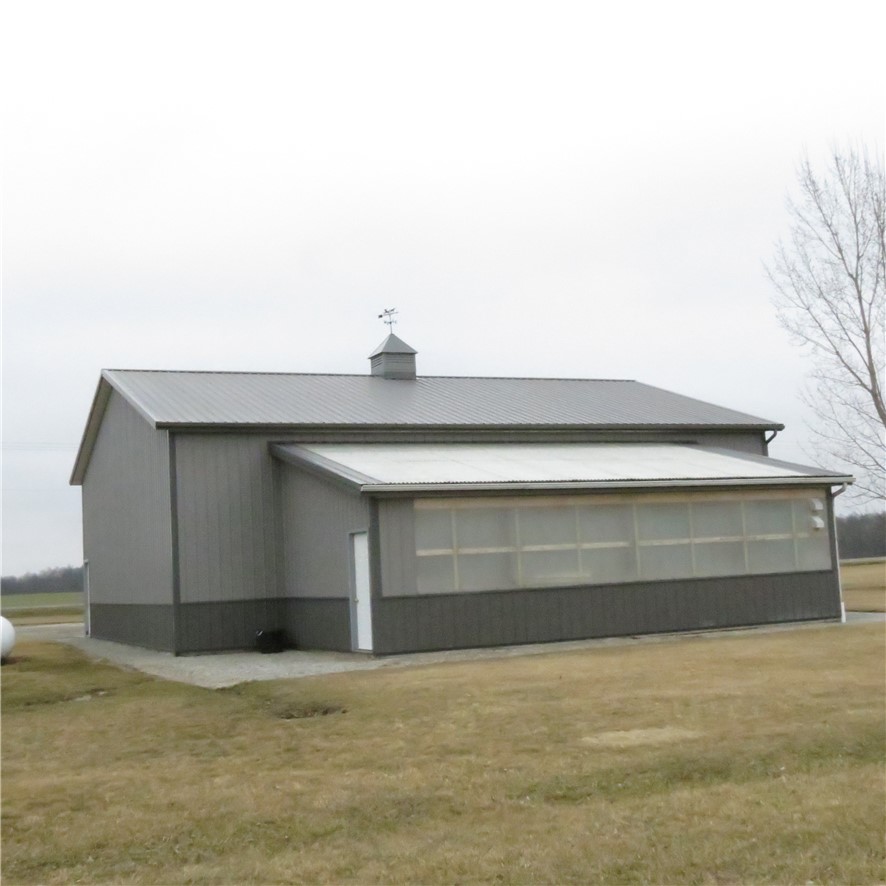 21242 Dingman-Slagle Road Pemberton, OH 45353 - Photo 27 of 33 This expansive structure features a classic cupola and a functional screened-in porch, ideal for various uses.