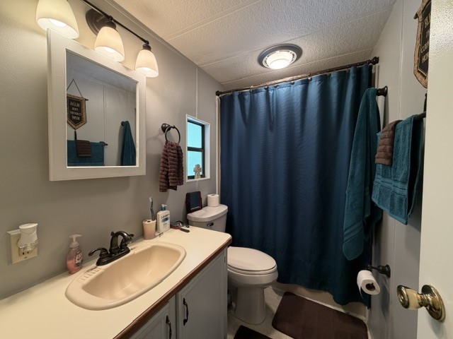 2795 East 28th Road Marseilles, IL 61341 - Photo 14 of 63 a bathroom with a sink vanity mirror and toilet