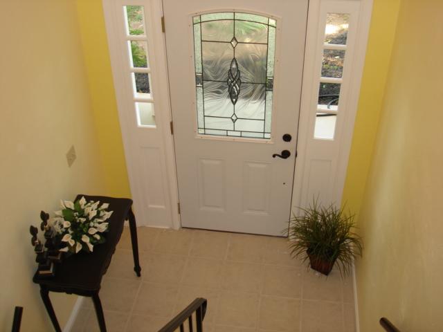278 Mountain Pass Road Blue Ridge, VA 24064 - Photo 2 of 19 a view of a hallway with wooden floor and a bathroom
