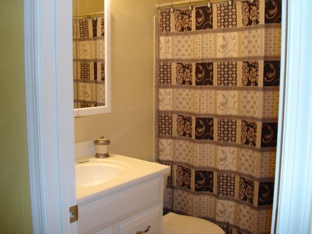 278 Mountain Pass Road Blue Ridge, VA 24064 - Photo 13 of 19 a bathroom with a granite countertop sink and a mirror