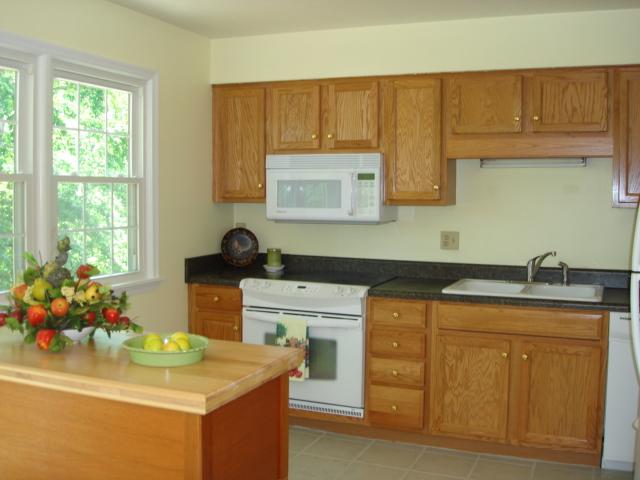 278 Mountain Pass Road Blue Ridge, VA 24064 - Photo 7 of 19 a kitchen with sink cabinets and window