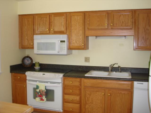 278 Mountain Pass Road Blue Ridge, VA 24064 - Photo 9 of 19 a kitchen with stainless steel appliances granite countertop a sink stove and cabinets