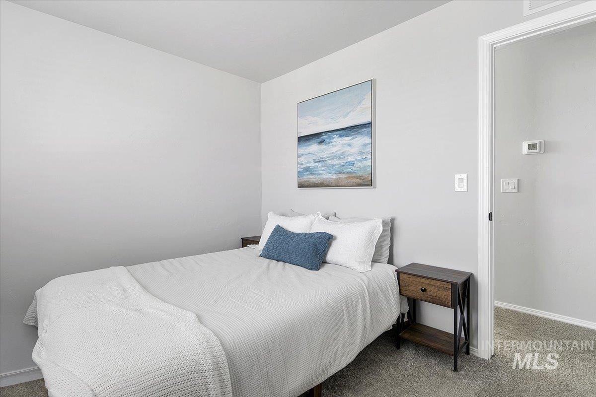 13520 Farwell Street Caldwell, ID 83607 - Photo 13 of 26 Bedroom with carpet floors and baseboards