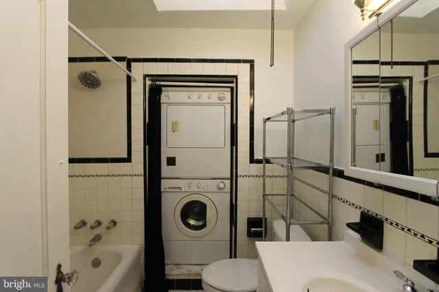 a bathroom with a toilet and a sink