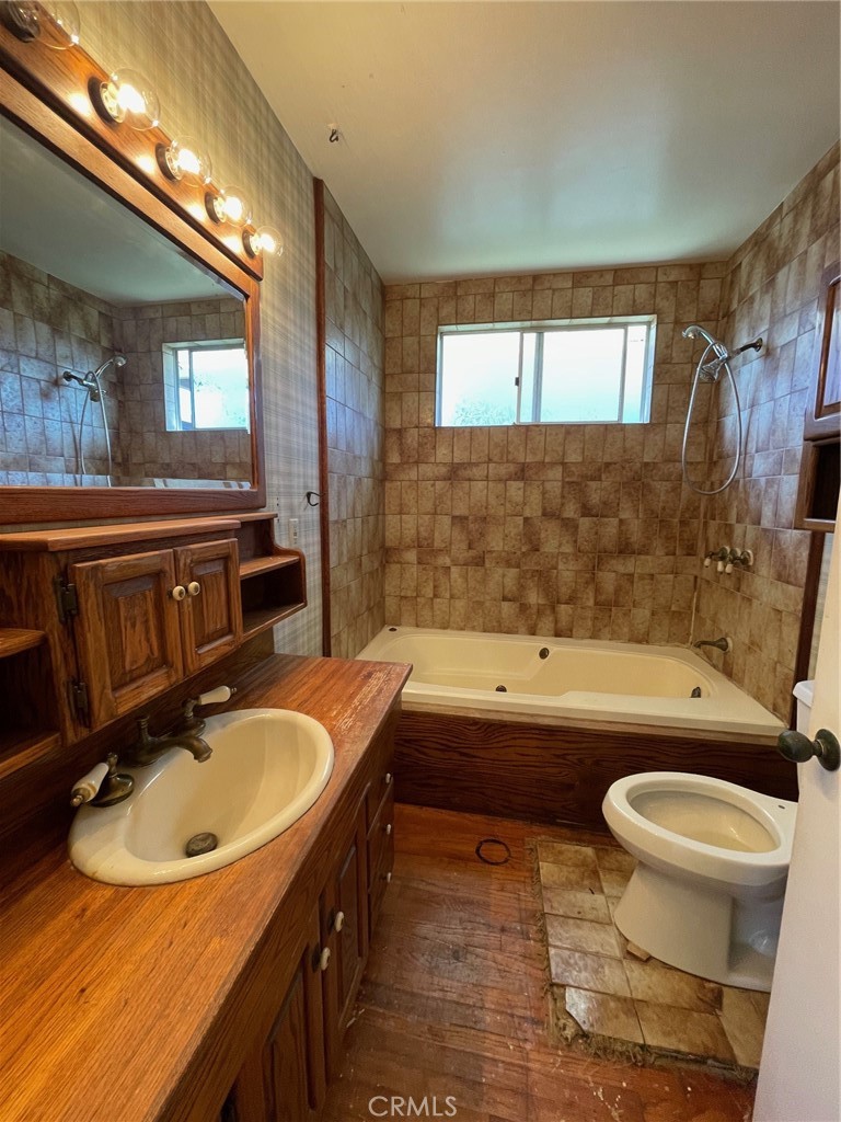 2004 Ripley Avenue Redondo Beach, CA 90278 - Photo 13 of 18 a bathroom with a sink toilet bathtub and mirror