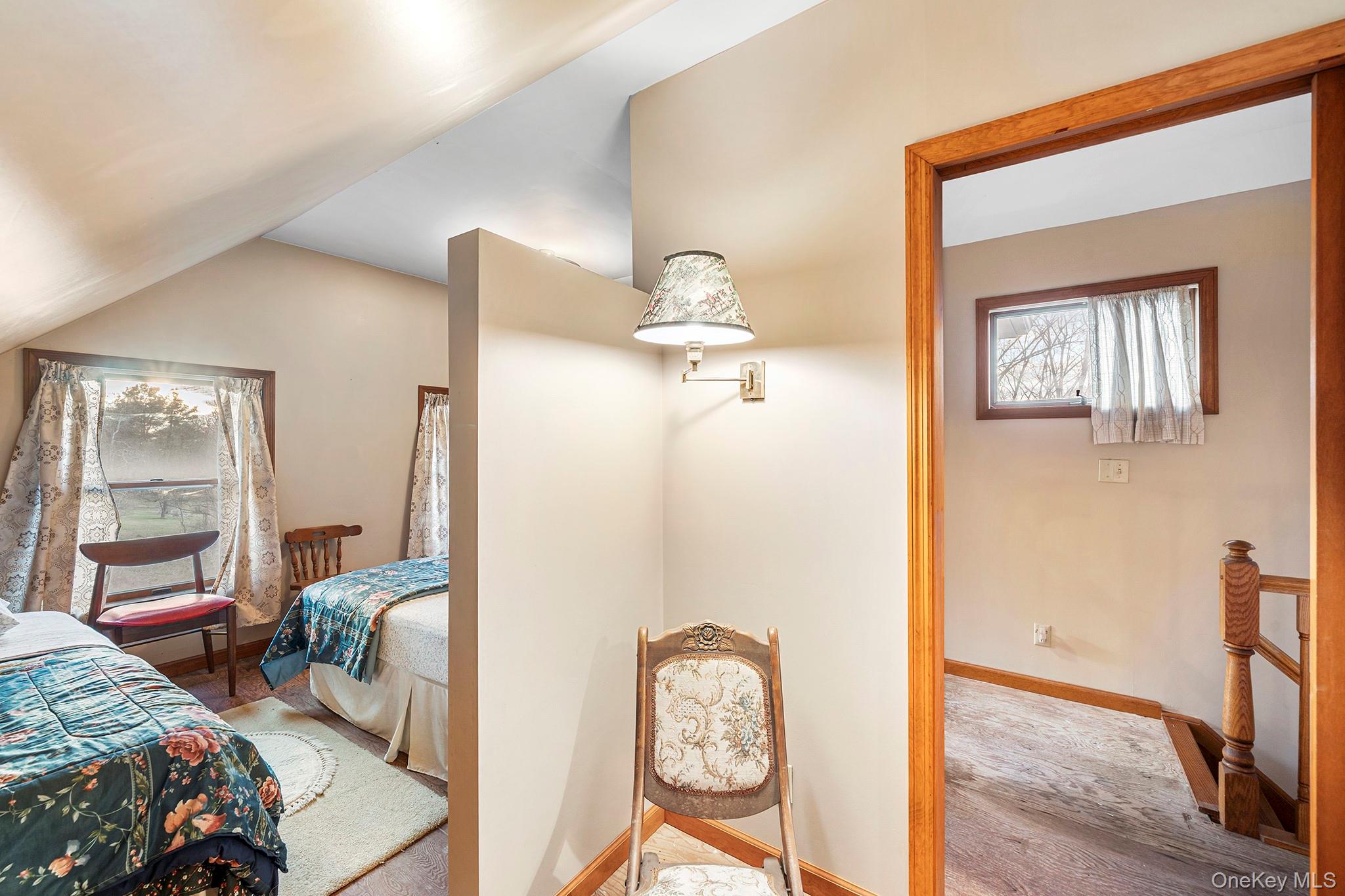 290 Ridge Road Campbell Hall, NY 10916 - Photo 16 of 26 a view of a bedroom with bed and workspace