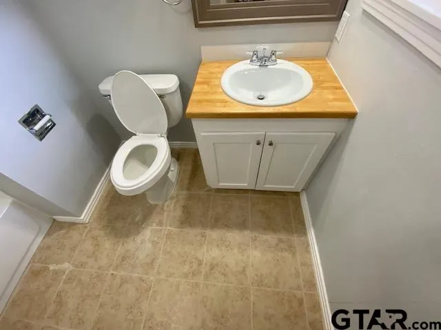 a bathroom with a sink and a vanity