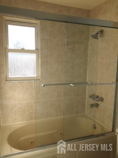 19A Gramercy Gardens Place Middlesex, NJ 08846 - Photo 7 of 8 a bathroom with a shower and a sink