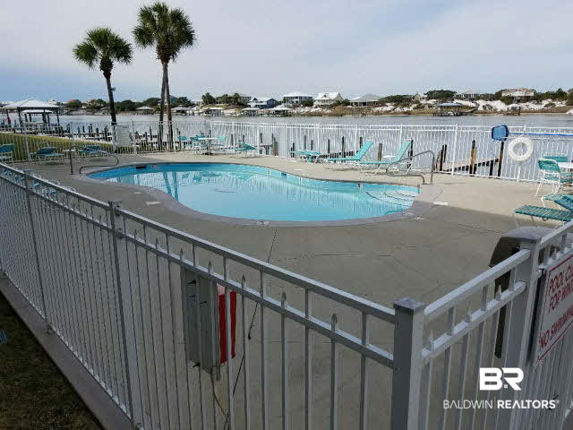 28875 Perdido Beach Boulevard, Unit 1A Orange Beach, AL 36561 - Photo 23 of 25 Pool just a few steps away on this ground level unit