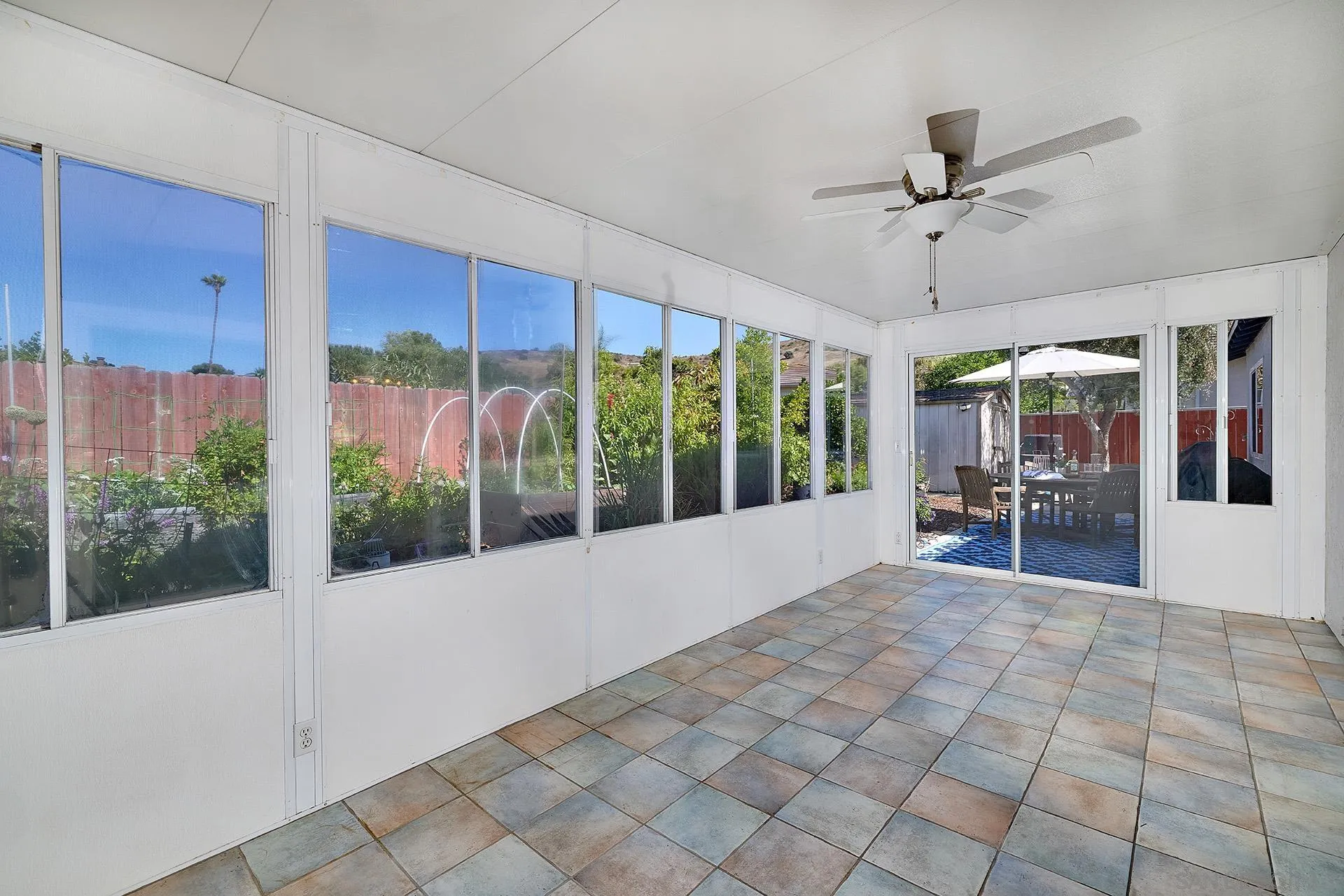12835 Reo Real Drive Poway, CA 92064 - Photo 12 of 46 a view of a room with windows and table