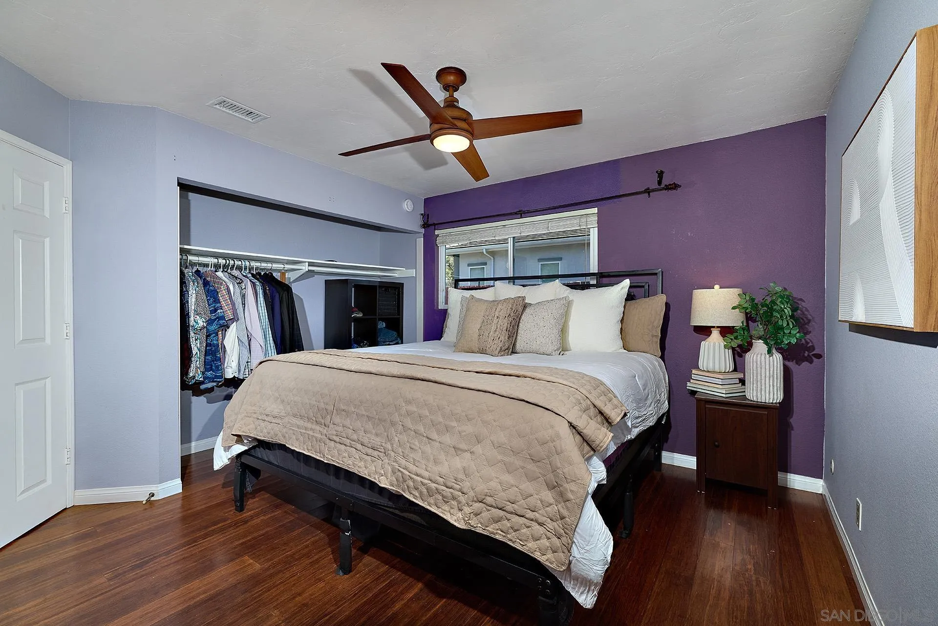 12835 Reo Real Drive Poway, CA 92064 - Photo 25 of 46 a bedroom with a bed and a ceiling fan