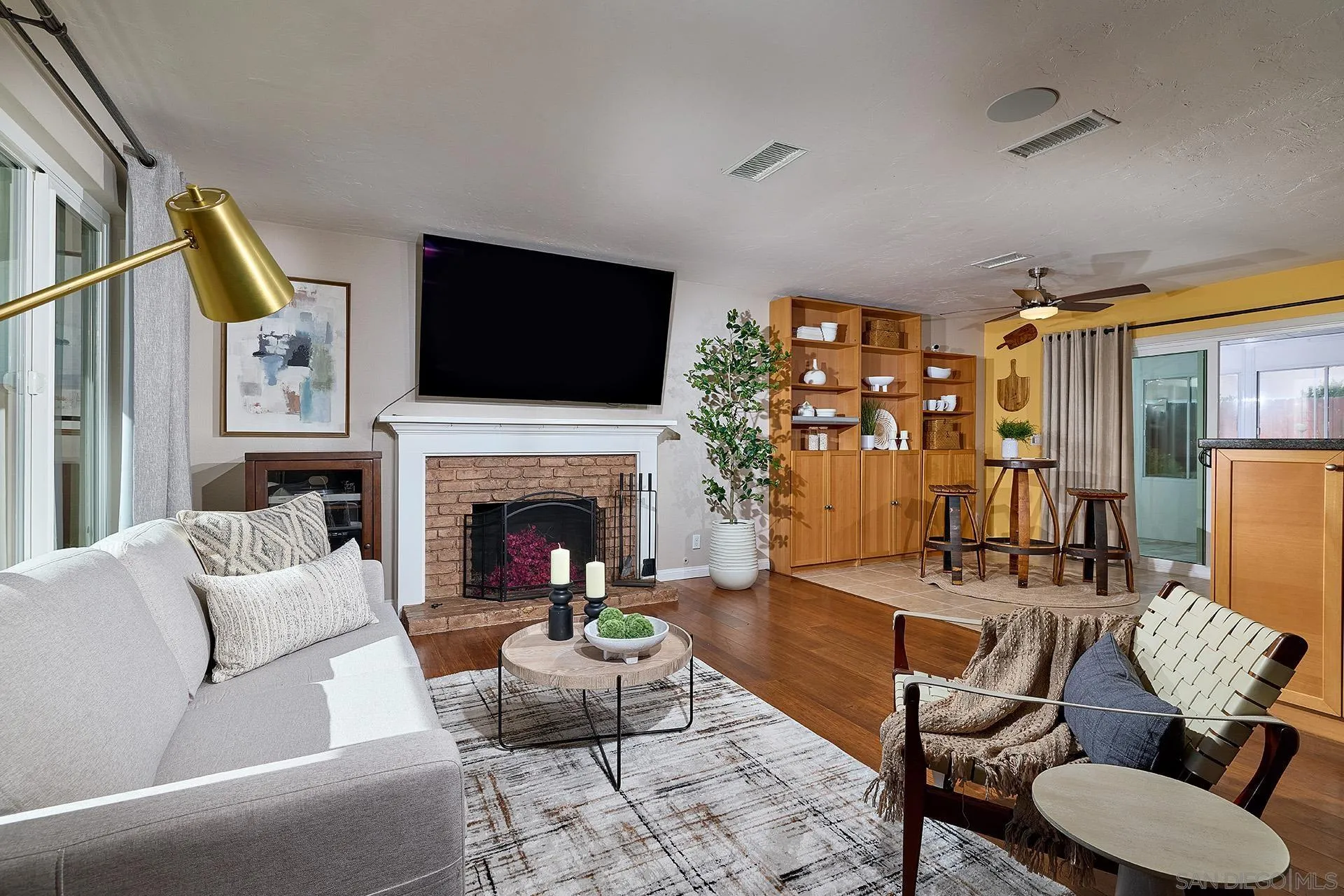 12835 Reo Real Drive Poway, CA 92064 - Photo 7 of 46 a living room with furniture fireplace and flat screen tv