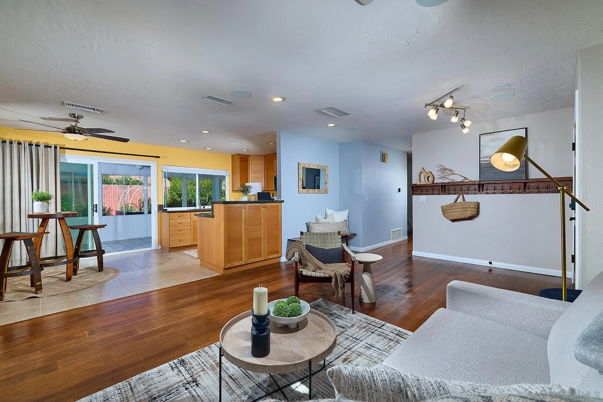 12835 Reo Real Drive Poway, CA 92064 - Photo 8 of 46 a living room with furniture and wooden floor