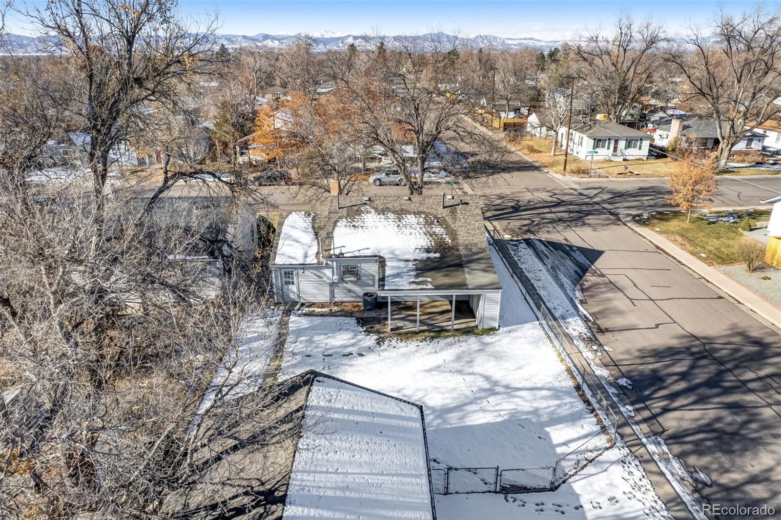 4500 South Washington Street Englewood, CO 80113 - Photo 23 of 30 a view of a yard with plants and trees