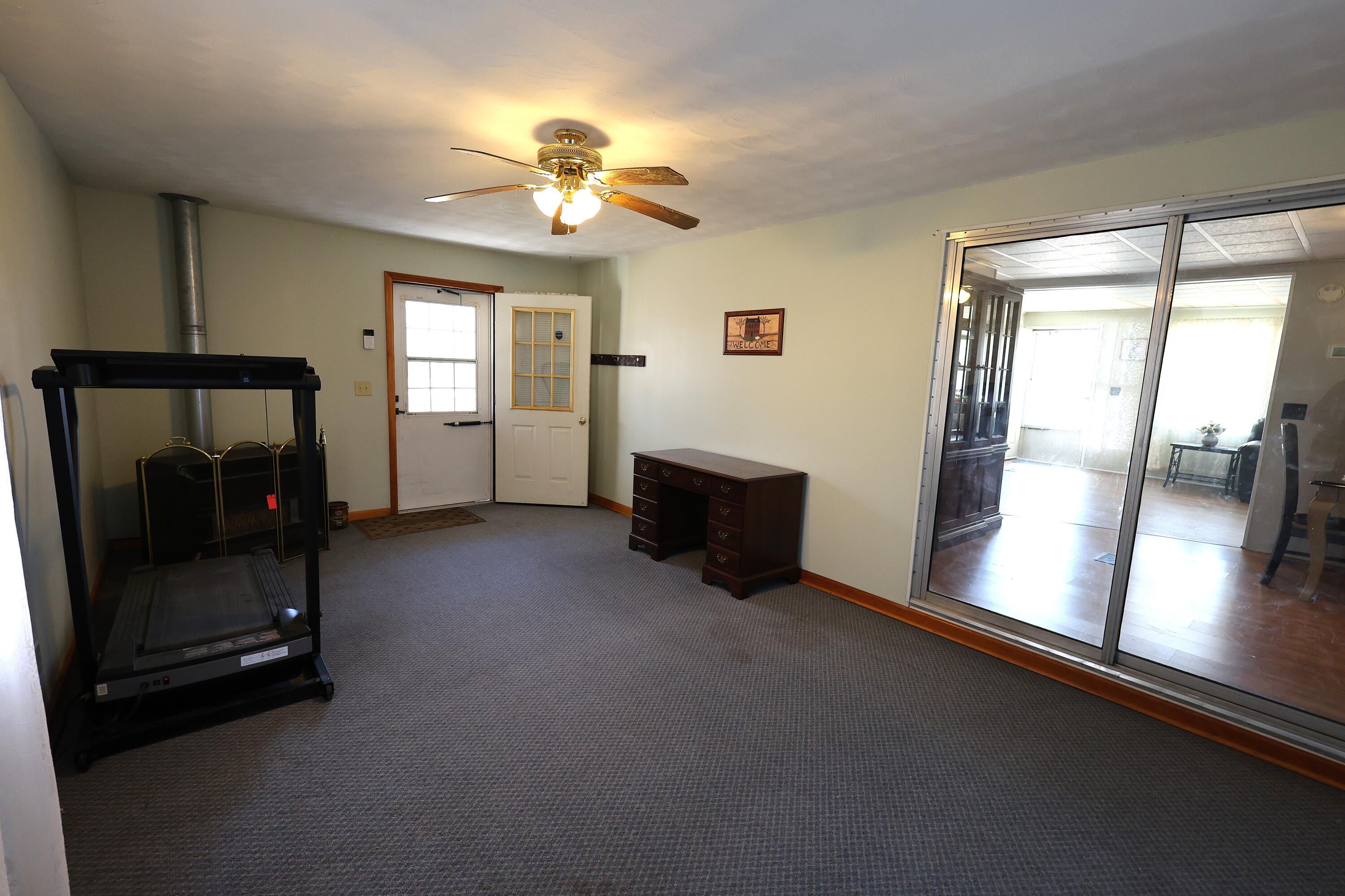 105 Stewart Fork Road Ravenna, KY 40472 - Photo 24 of 59 Has a free standing gas heater.