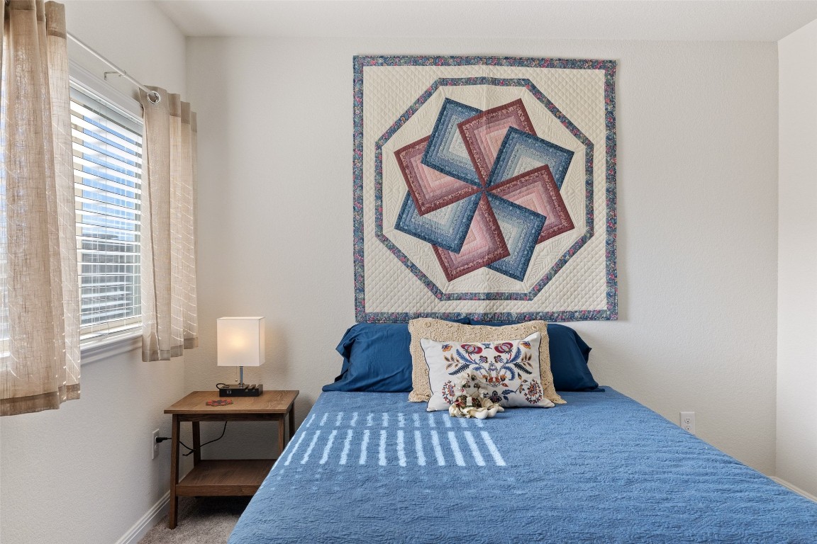 11701 Pecangate Way Manor, TX 78653 - Photo 31 of 40 a living room with furniture and wooden floor