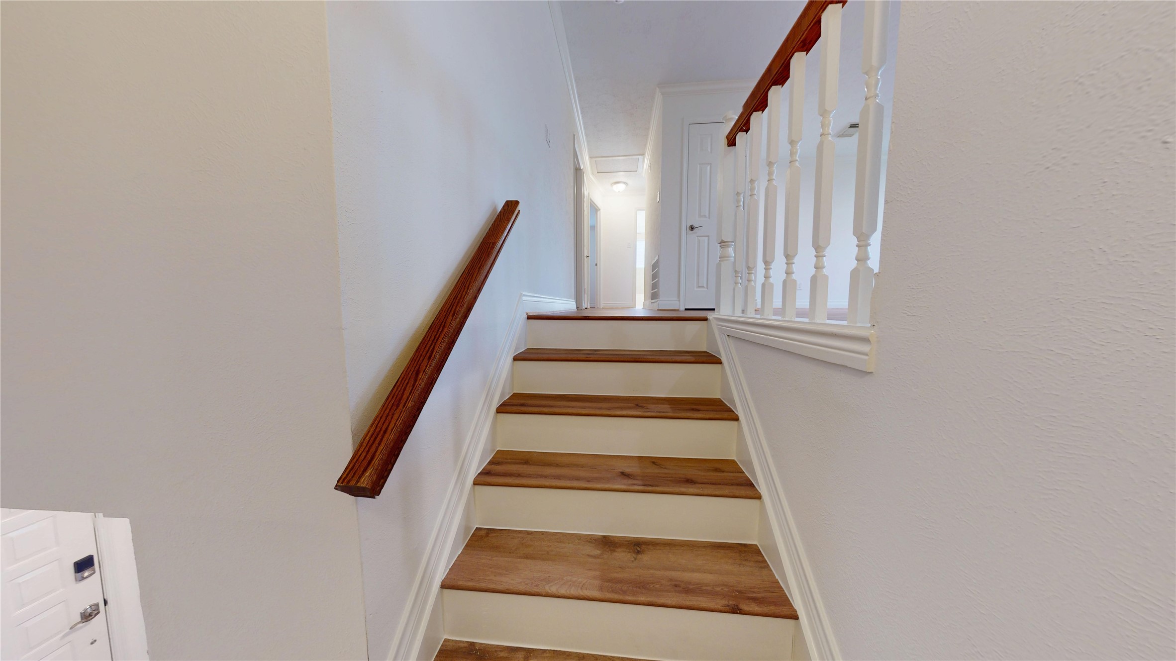 16418 Rainbow Lake Road Houston, TX 77095 - Photo 23 of 47 Newly remodeled stairs lead to the over-size game room and additional bedrooms.