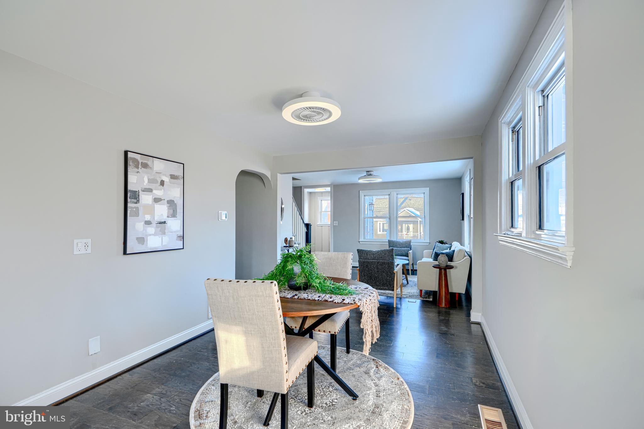 1203 Hilldale Road Baltimore, MD 21237 - Photo 13 of 55 a view of a dining room with furniture window and wooden floor