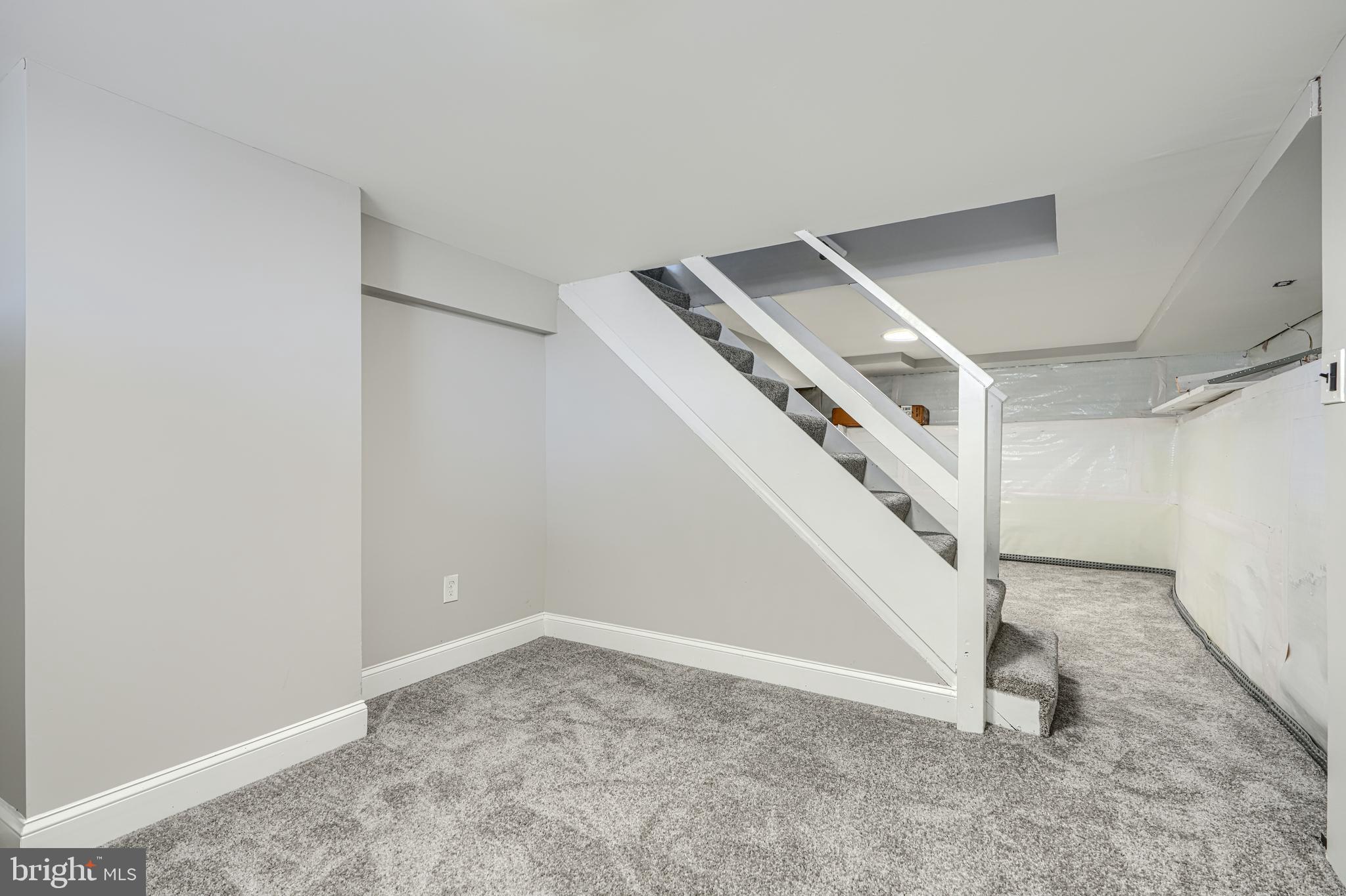 1203 Hilldale Road Baltimore, MD 21237 - Photo 40 of 55 a view of an empty room with stairs