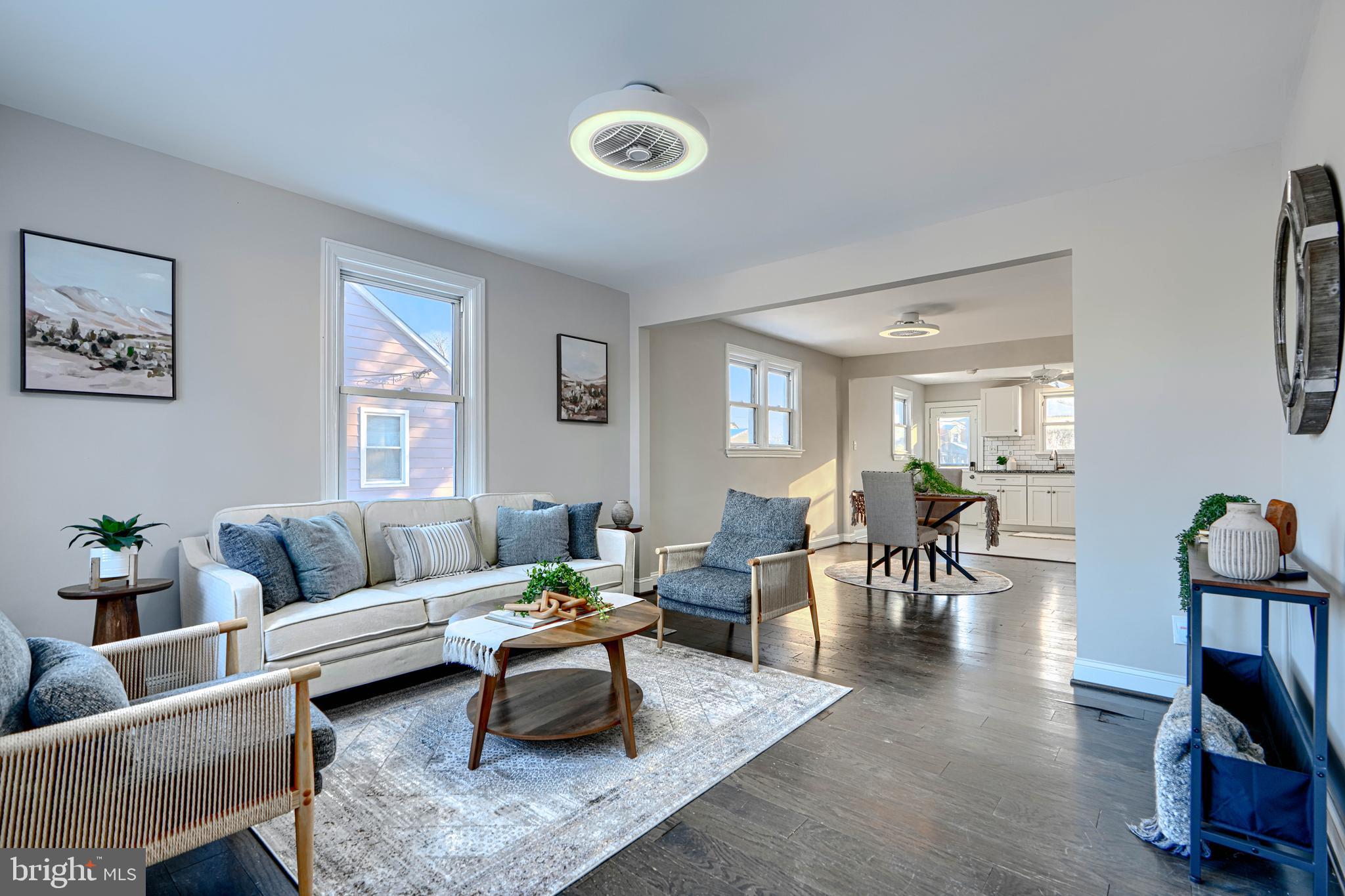1203 Hilldale Road Baltimore, MD 21237 - Photo 4 of 55 a living room with furniture wooden floor and a window