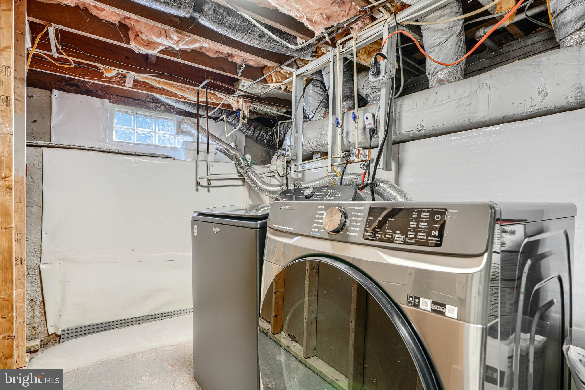 1203 Hilldale Road Baltimore, MD 21237 - Photo 46 of 55 a utility room with dryer and washer
