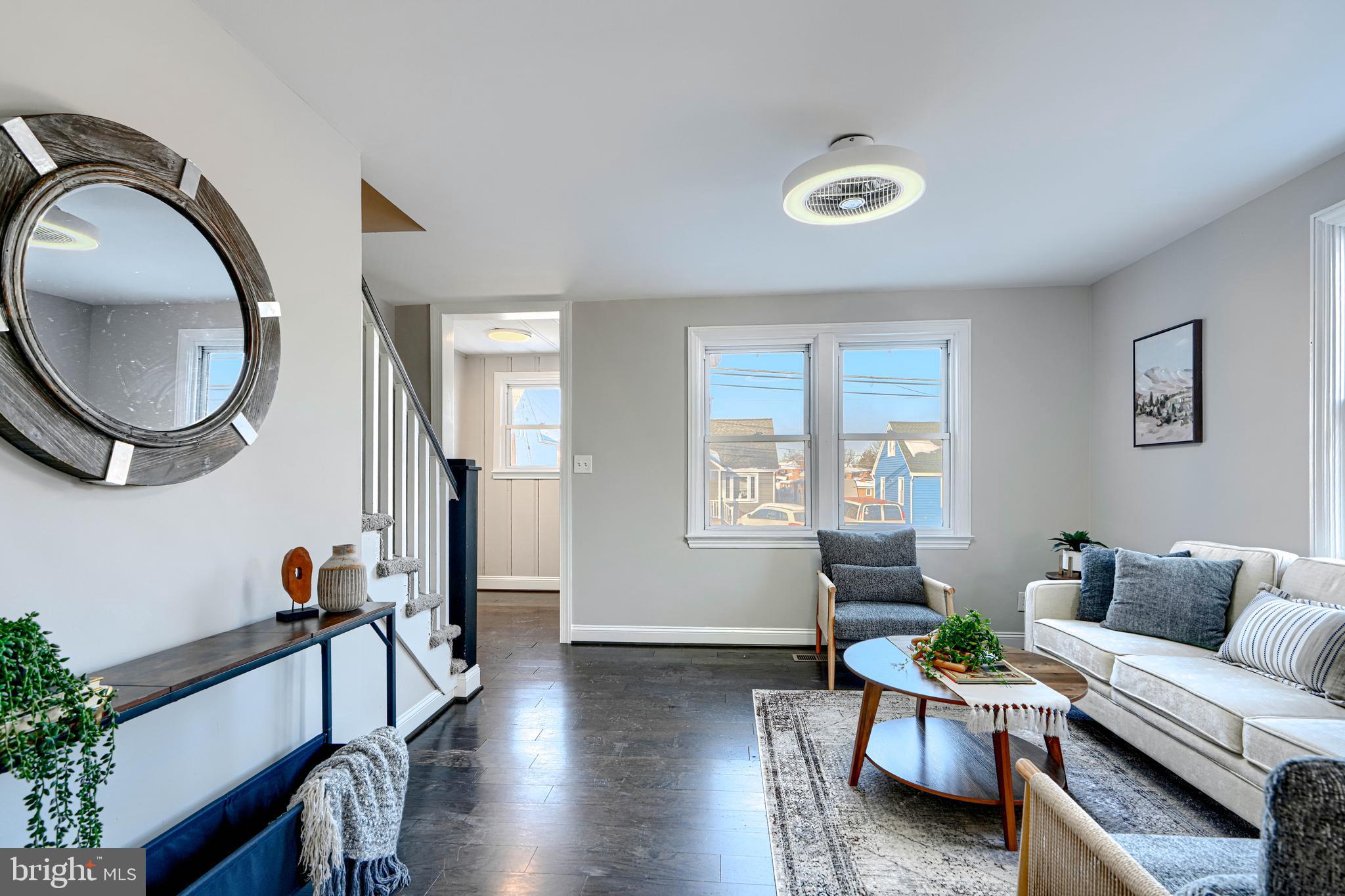 1203 Hilldale Road Baltimore, MD 21237 - Photo 8 of 55 a living room with furniture and a wooden floor