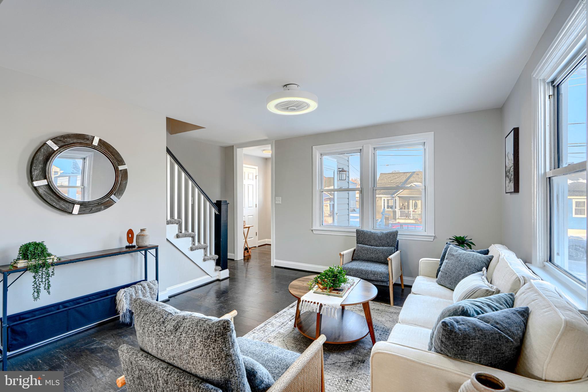 1203 Hilldale Road Baltimore, MD 21237 - Photo 9 of 55 a living room with furniture and a window