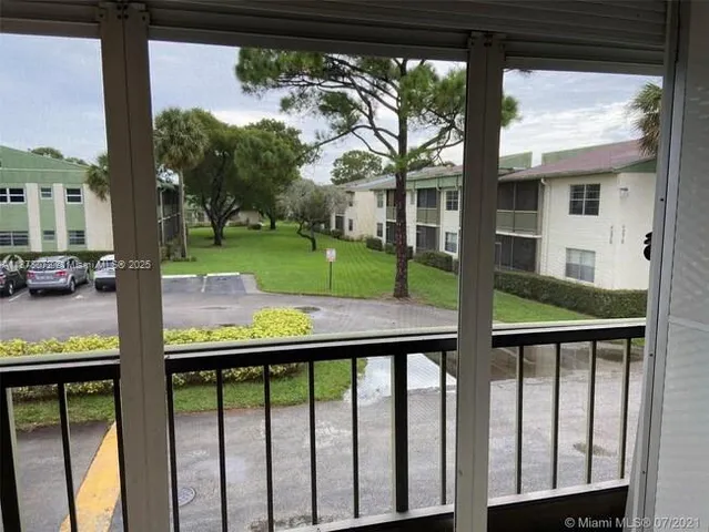 a view of a porch with a yard