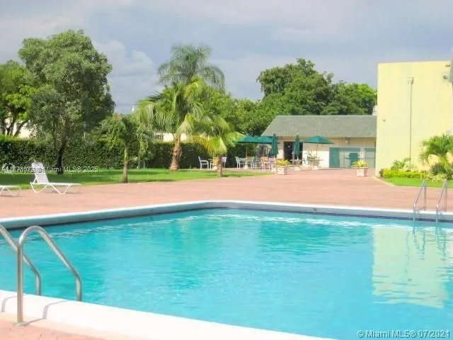 a view of a house with a swimming pool