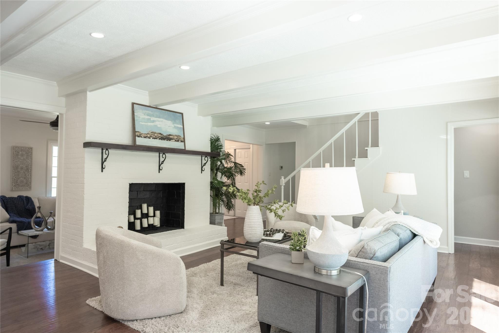 123 Old Bell Road Charlotte, NC 28270 - Photo 13 of 46 a living room with furniture and a fireplace