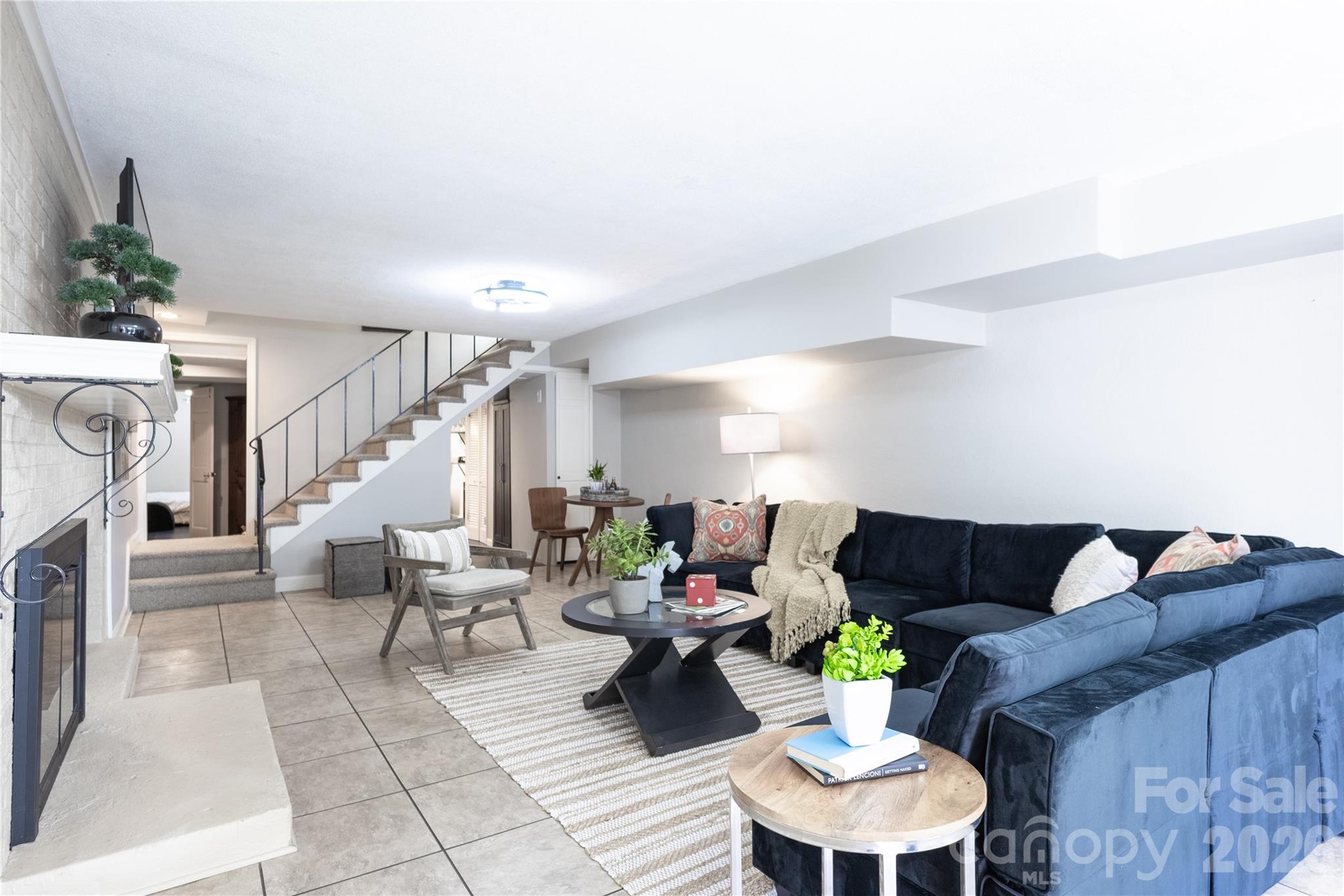 123 Old Bell Road Charlotte, NC 28270 - Photo 25 of 46 a living room with furniture and a fireplace
