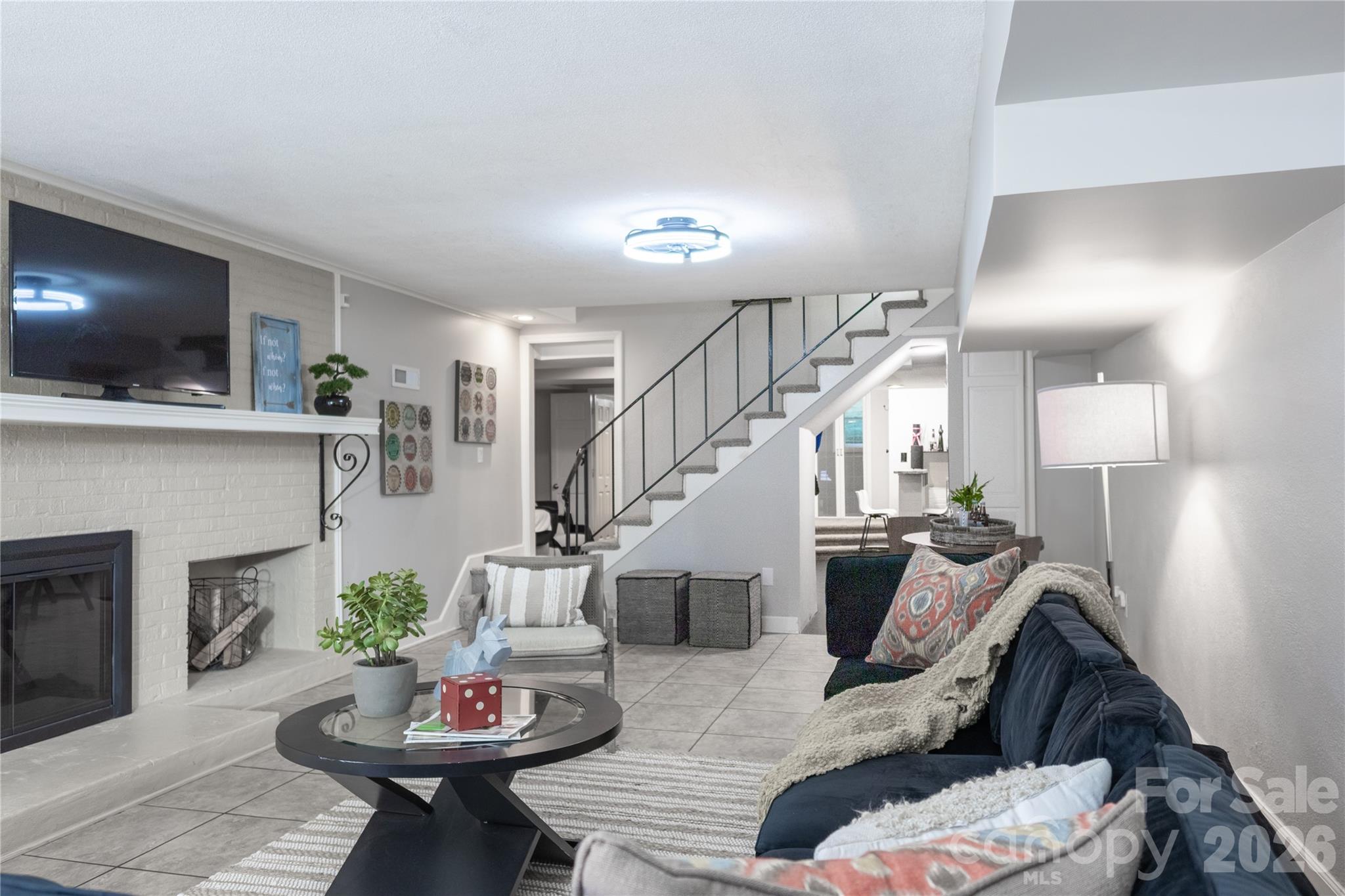 123 Old Bell Road Charlotte, NC 28270 - Photo 27 of 46 a living room with furniture and a flat screen tv