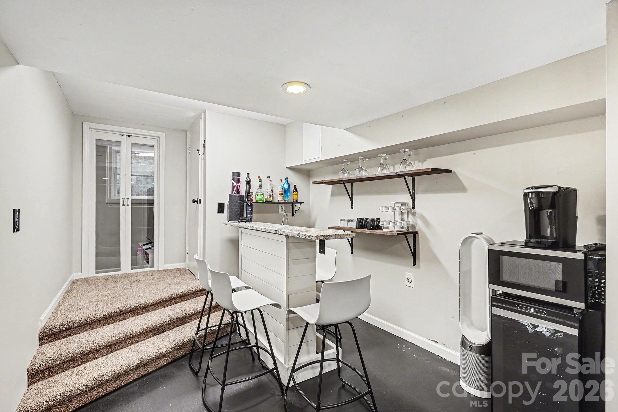 123 Old Bell Road Charlotte, NC 28270 - Photo 31 of 46 a view of a dining room with furniture window and wooden floor