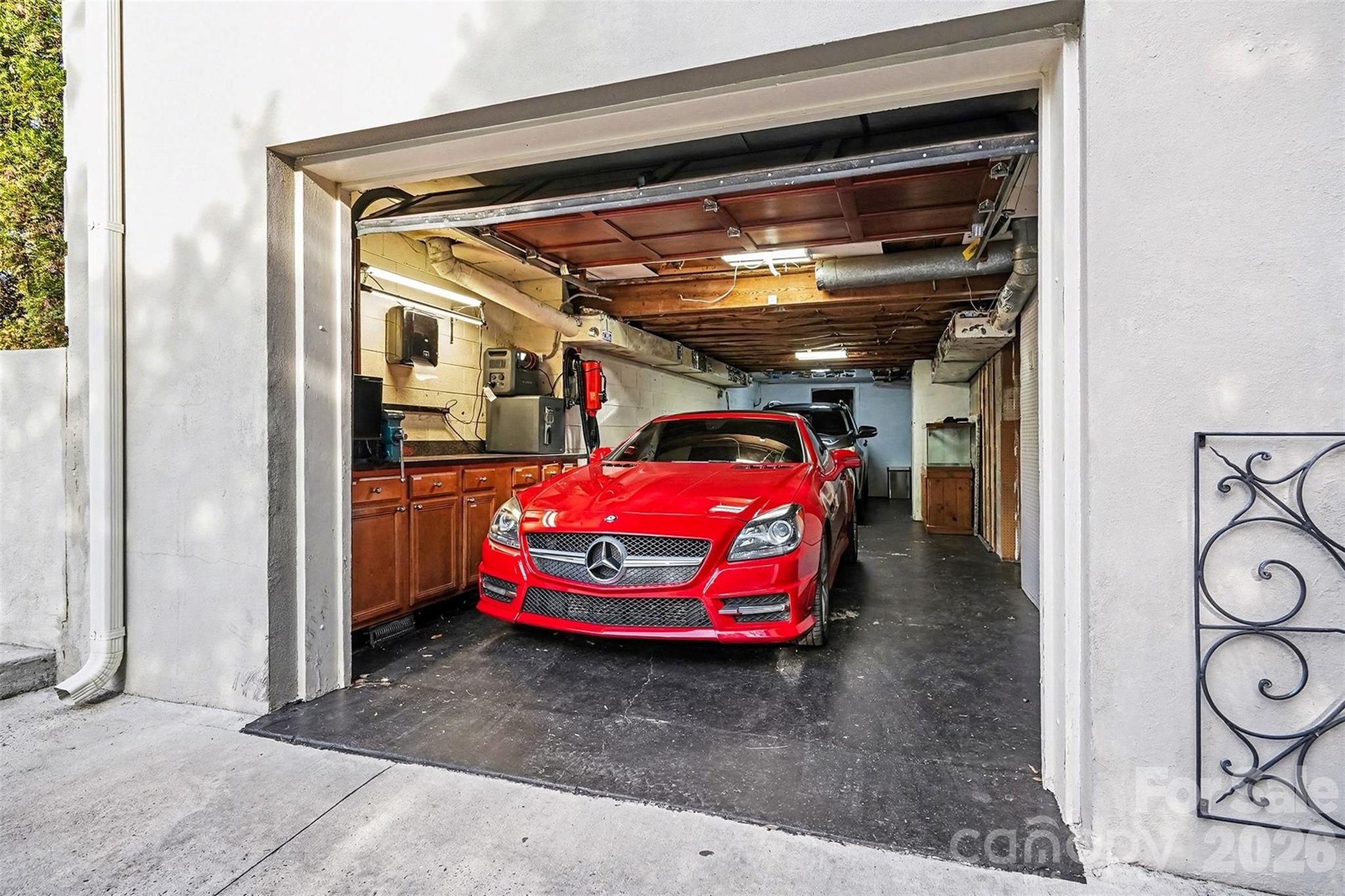 123 Old Bell Road Charlotte, NC 28270 - Photo 42 of 46 a car parked in a garage