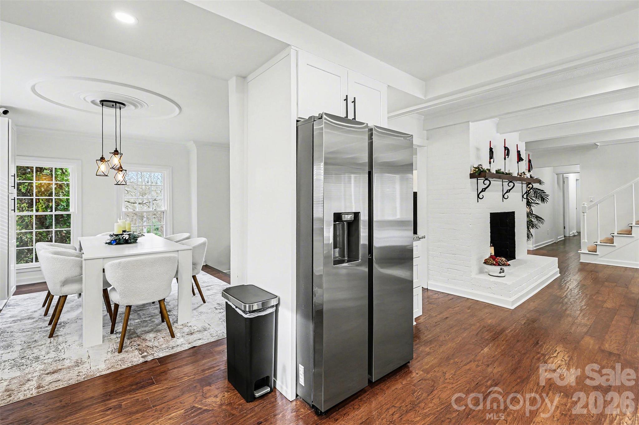 123 Old Bell Road Charlotte, NC 28270 - Photo 10 of 46 a kitchen with a refrigerator and a table chair