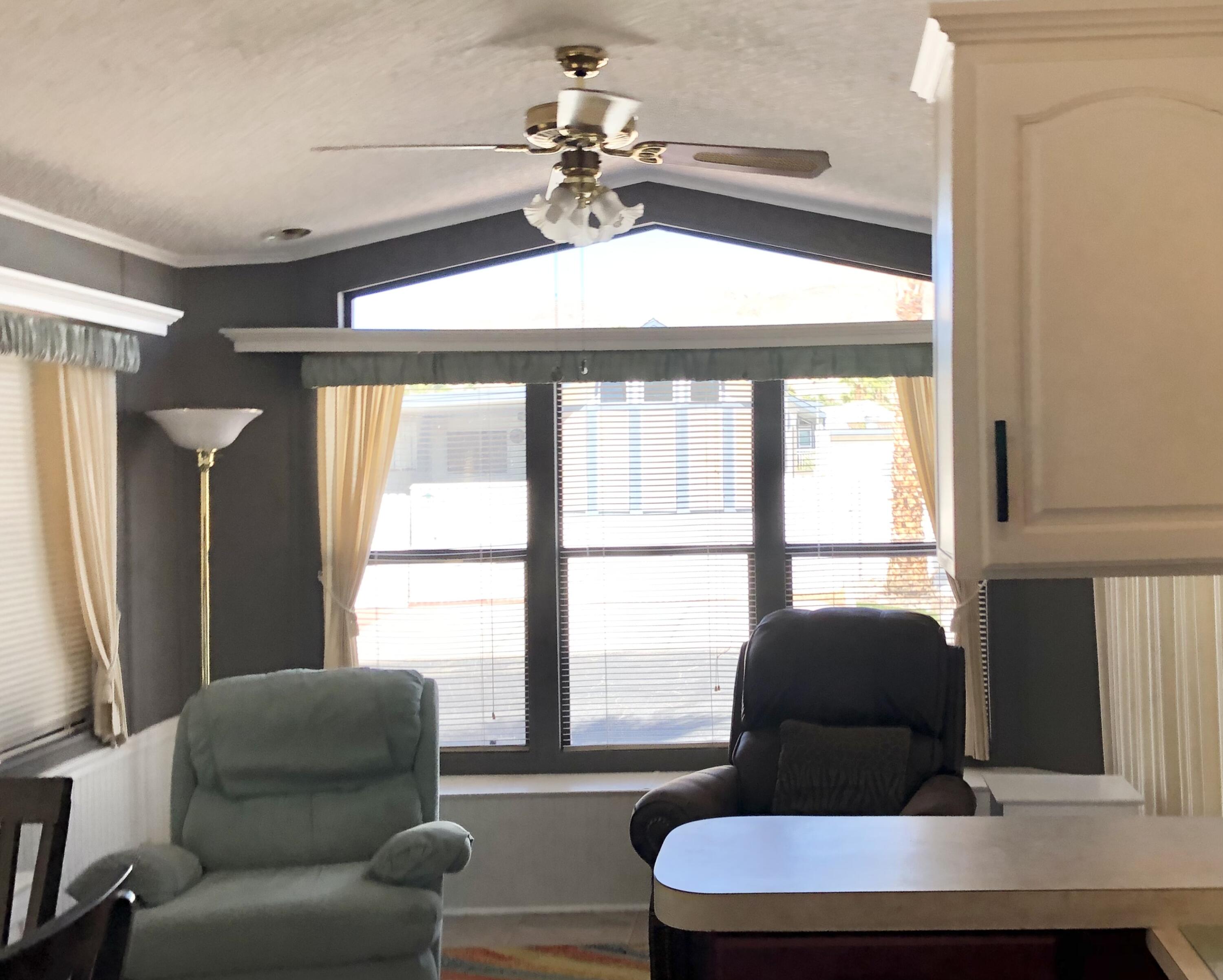 74711 Dillon Road Desert Hot Springs, CA 92241 - Photo 7 of 44 a living room with furniture and a large window