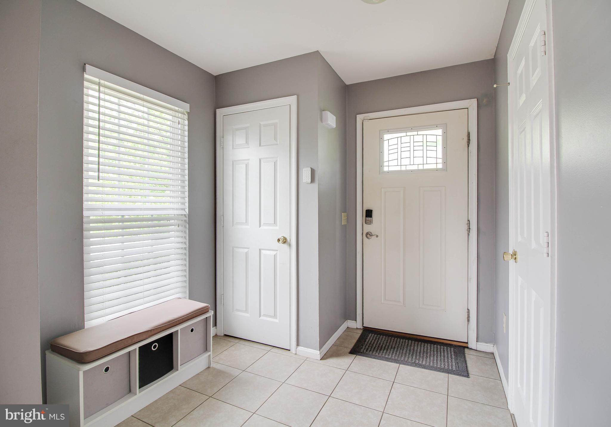 421 Maple Forest Road Catonsville, MD 21228 - Photo 2 of 56 Welcoming Foyer with closet and 1/2 bath