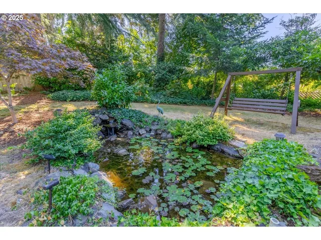 a view of backyard with green space