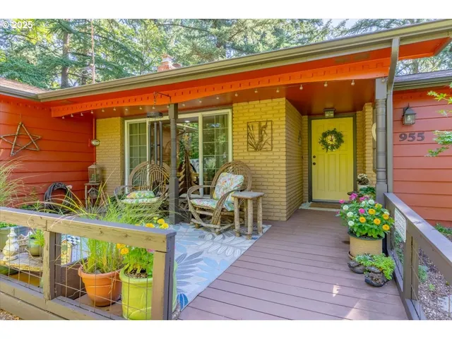 a backyard of a house with outdoor seating