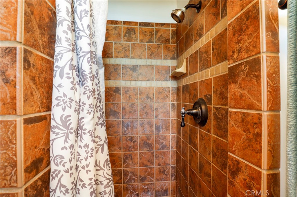 576 East Columbia Avenue Pomona, CA 91767 - Photo 19 of 27 a bathroom with a shower