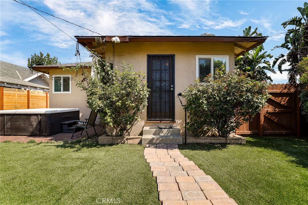 576 East Columbia Avenue Pomona, CA 91767 - Photo 20 of 27 a front view of a house with garden