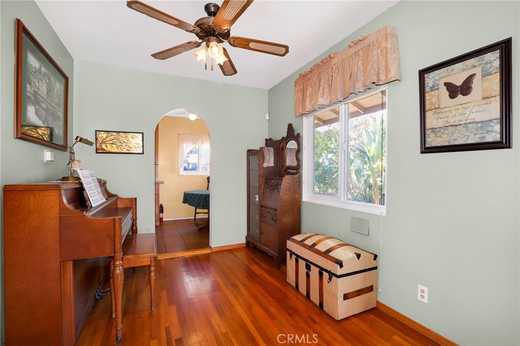 576 East Columbia Avenue Pomona, CA 91767 - Photo 7 of 27 a living room with furniture and a window