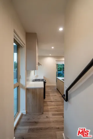 a view of living room with furniture and a table
