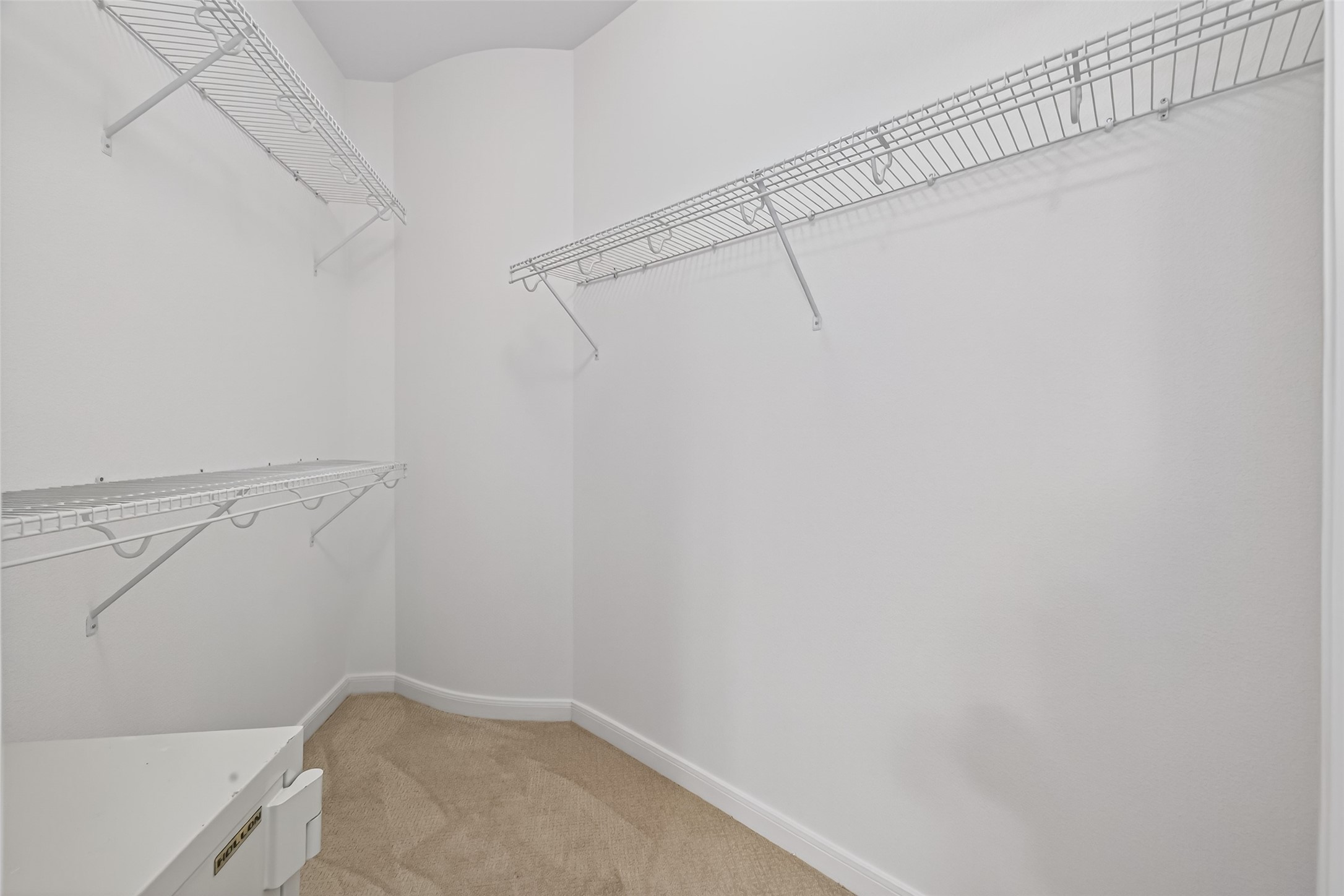 505 Jackson Hill Street, Unit 404 Houston, TX 77007 - Photo 20 of 24 a view of a room with racks on the wall