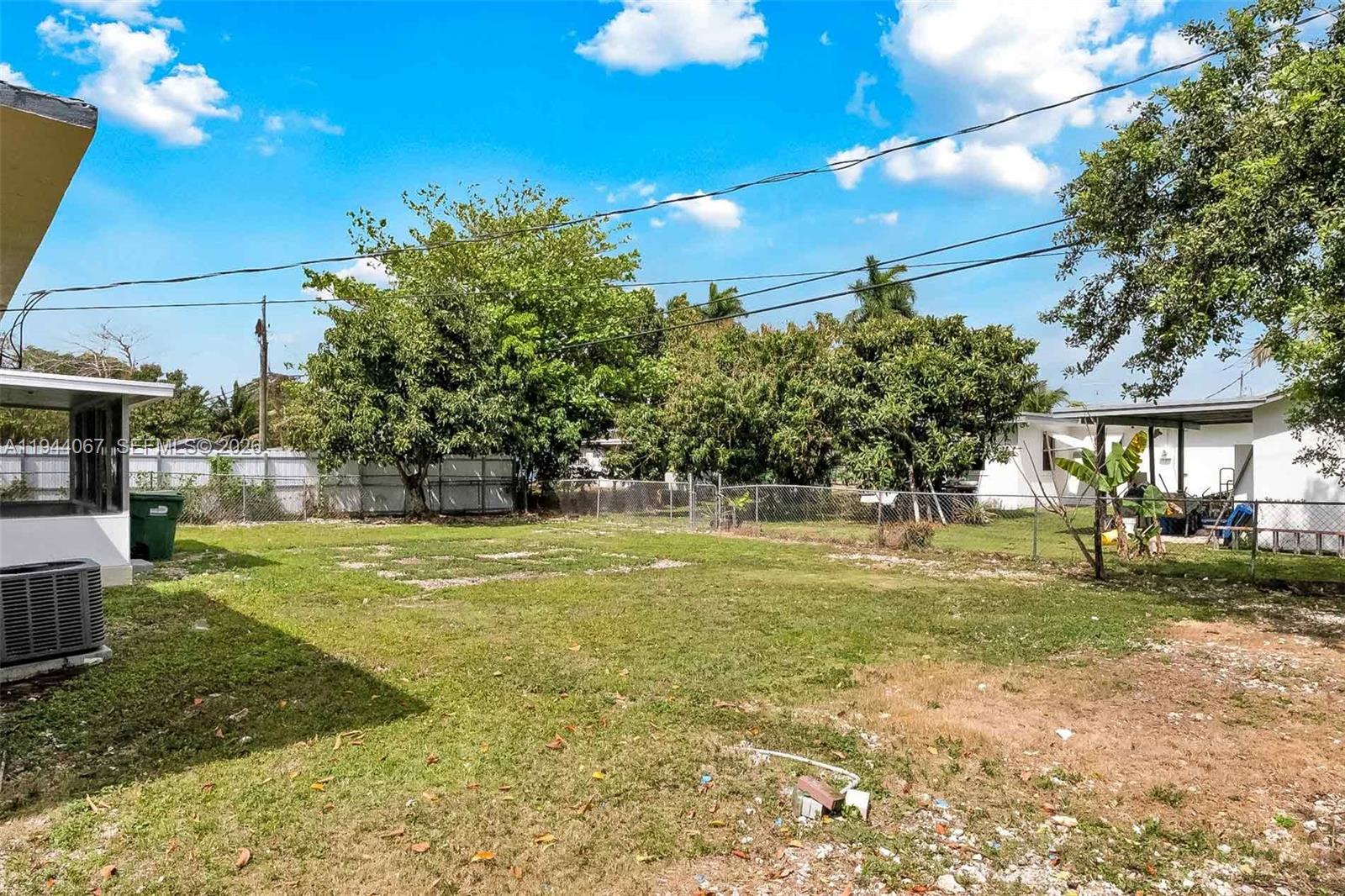 15351 Southwest 296th Street Homestead, FL 33033 - Photo 20 of 27 a view of a house with a yard