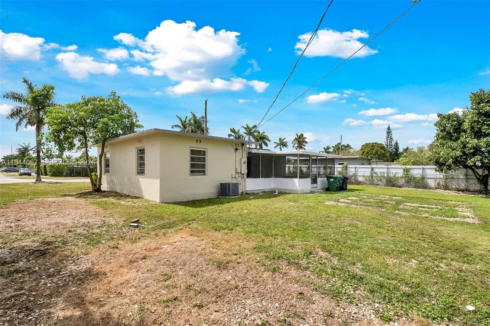 15351 Southwest 296th Street Homestead, FL 33033 - Photo 21 of 27 a view of a house with backyard and sitting area