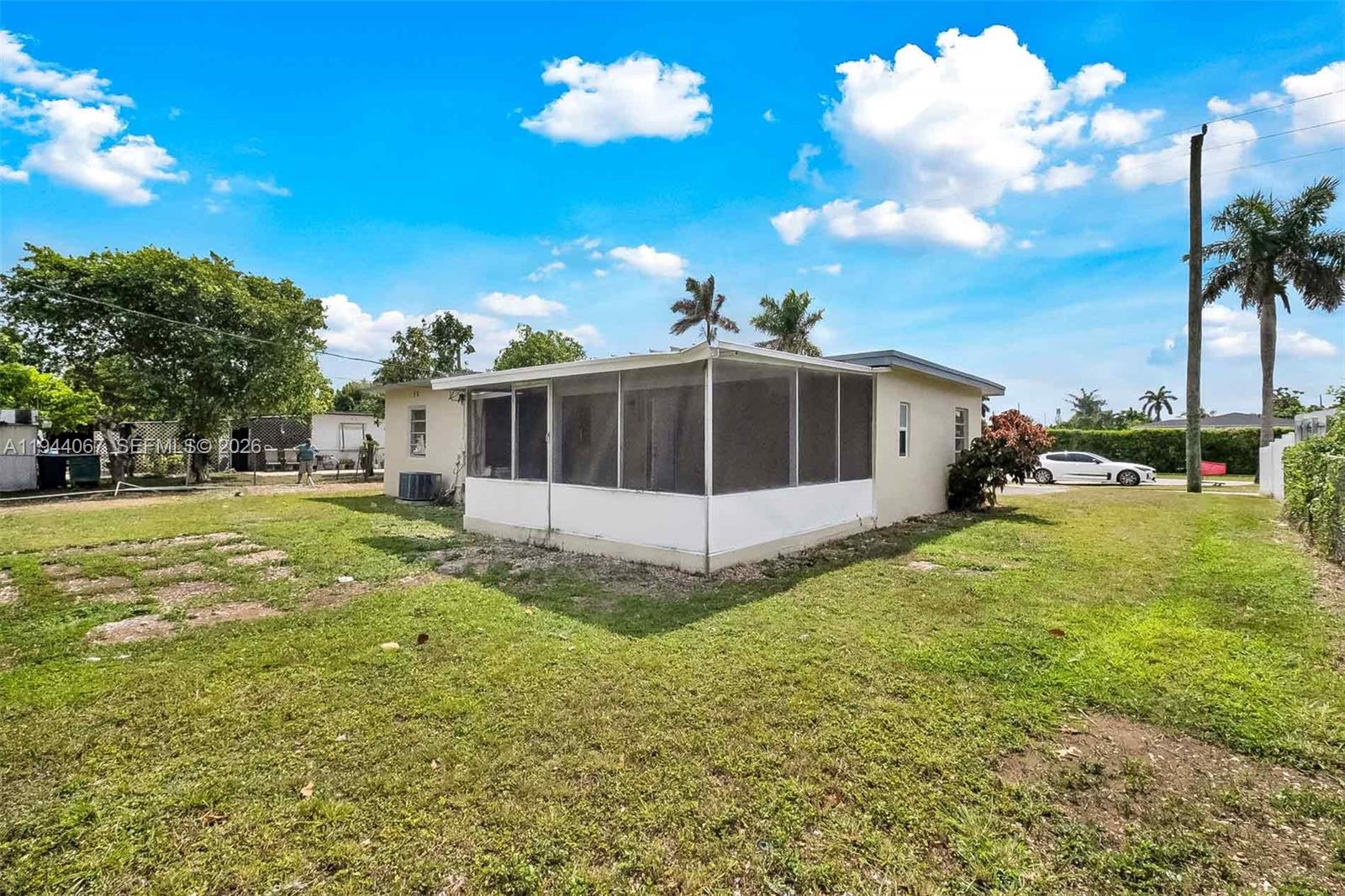 15351 Southwest 296th Street Homestead, FL 33033 - Photo 22 of 27 a view of a house with a yard